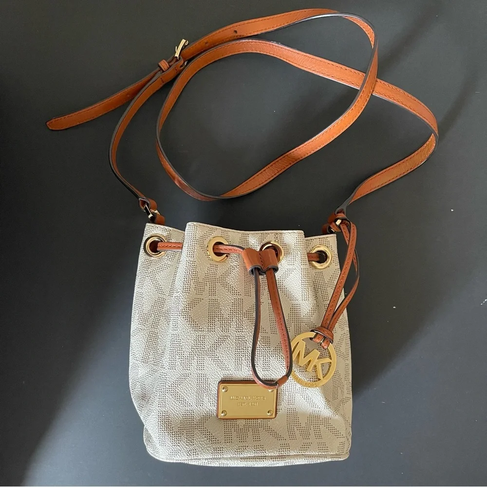 Michael Kors brown and cream Bucket crossbody bag.